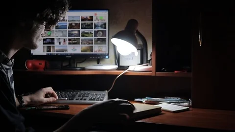 Man works at home at the computer 動画素材 125091713