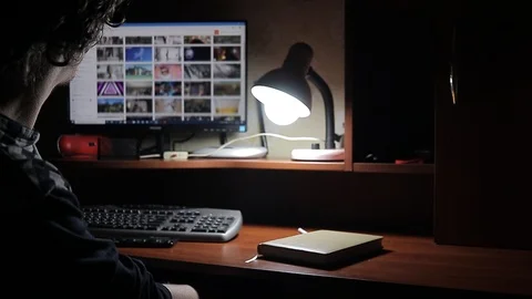 Man works at home at the computer 動画素材 125091745