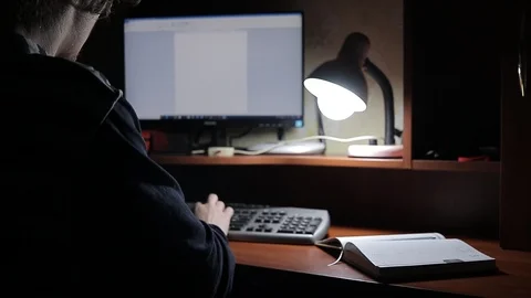 Man works at home at the computer 動画素材 125091895