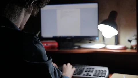 Man works at home at the computer 動画素材 125091917