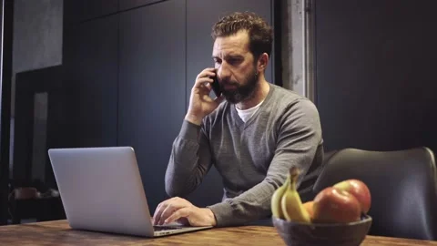 A man works at home Stock Footage 142780907