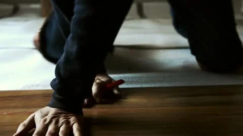 Man works. installs laminate Stock Footage 20534945