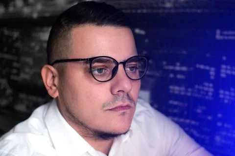 Man works on internet. Reflection at the glasses from laptop...Close up of .. Stock Photos