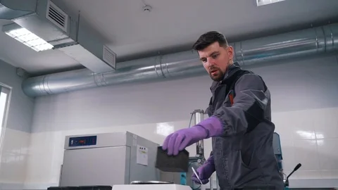 A man works in a laboratory close-up Stock Footage 112152091