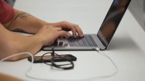 Man works on laptop close-up Stock Footage 85950645