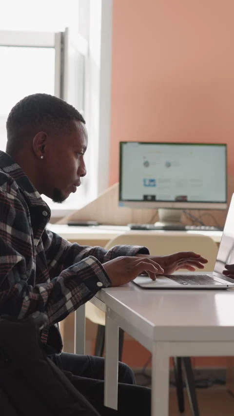 Man works with laptop in computer class Stock Footage 280451946