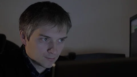 A man works at a laptop Stock Footage 102348640