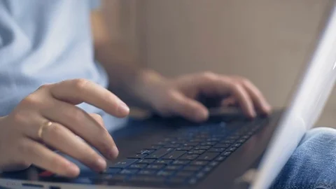 A man works on a laptop, a freelancer develops new goals 動画素材 104262762