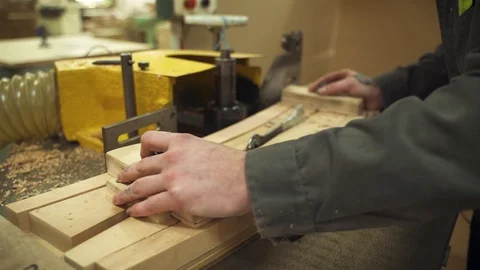 Man works on a machine Stock Footage 128368753