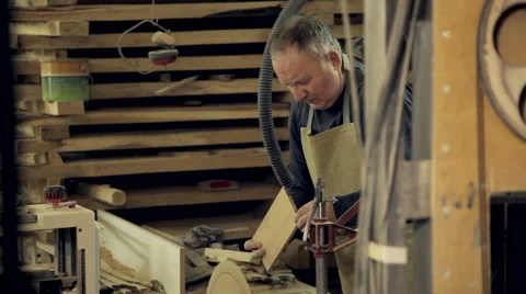 The man works at the machine with wood Video stock 59698587