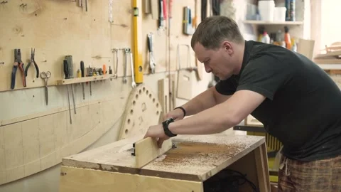 A man works on a milling machine Stock Footage 134615747