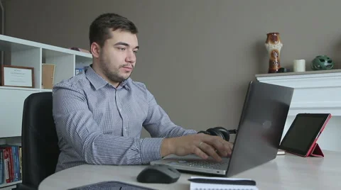 Man Works with Notebook Video stock 66255558