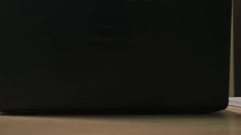 A man works in the office at a computer, a guy works at a computer at home Stock Footage 264131109