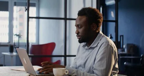 A man works in an office Stock Photos