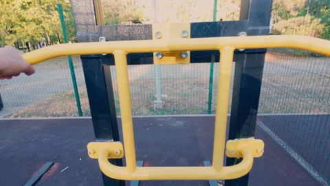 A man works out on a simulator, training his back muscles. Sport. Stock Footage 316844664