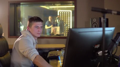 A man works in a recording studio Video stock 104076658