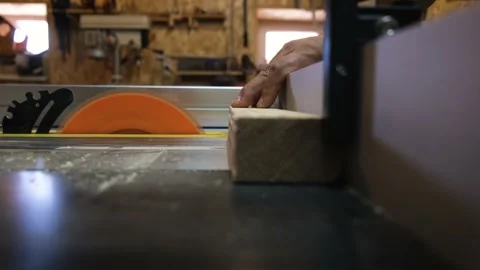 A man works on a saw machine Stock Footage 132238767
