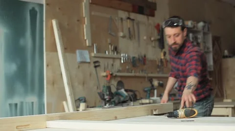 Man works as a screwdriver Stock Footage 61815764