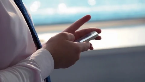 A man works on a smartphone Stock Footage 76000079