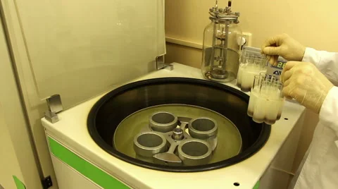 A man works using  centrifuge Stock Footage 58401457