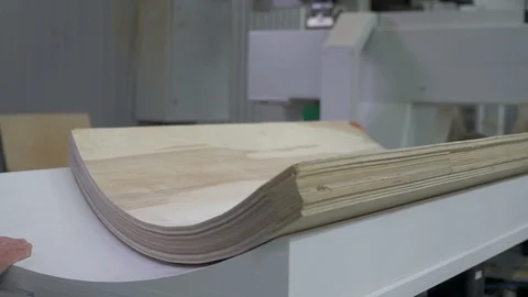 A man works on a woodworking machine. The operator of a modern machine tool i 動画素材 121906547