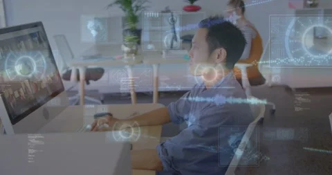 Man at workstation typing and clicking, expanding HUD panels and code blocks for Stock Footage 331336270