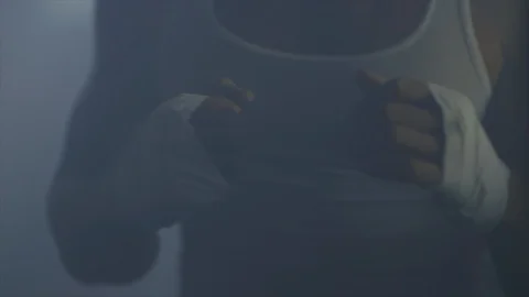 Man with Wrapped Hands Gets Ready to Punch HD Video Video stock 91549069