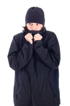Man wrapped up in winter jacket freezing Stock Photos