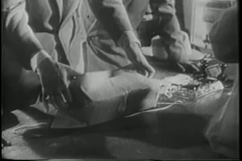 Man wrapping a box Stock Footage