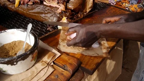Man wrapping grilled meat Stock Footage 80422790