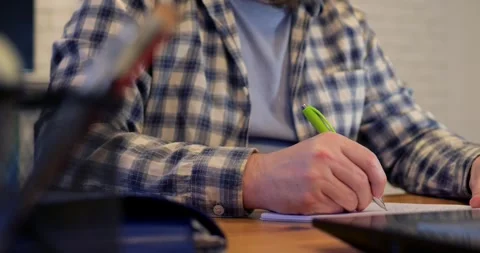 Man wraps up tasks early, promoting harmony that nurtures personal interests Stock Footage 301522852