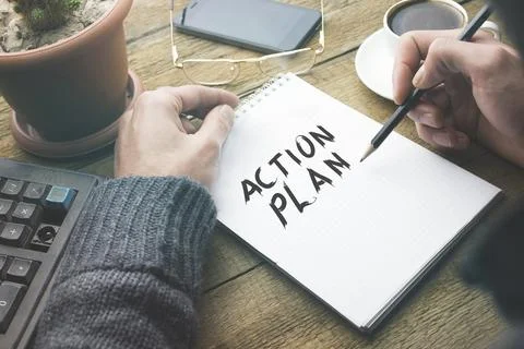 Man write action plan Stock Photos