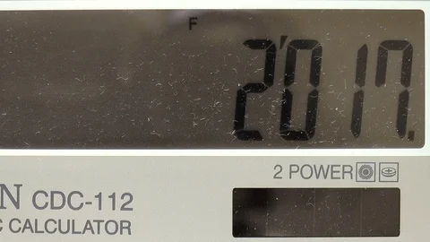 Man writes on a calculator of a 2018 Stock Footage 80719031