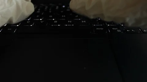 Man writes on the computer using sterile gloves Stock-Footage 127668149