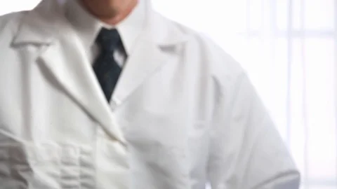 Man Writes COVID19 with Marker on Clear Surface Stock Footage 127011680