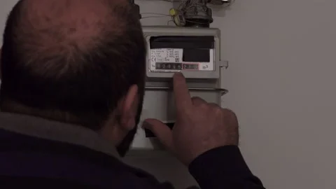 Man Writes Down The Gas Meter Stock Footage 220736283