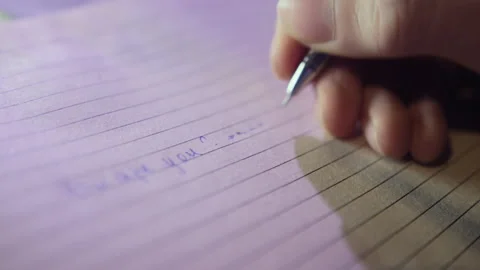 Man writes down special symbols of Morse code in notebook Stock Footage 230036591