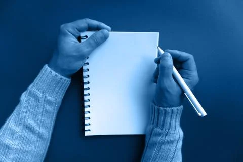 Man writes his plans, view from top, toned Stock Photos