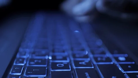 Man Writes Message to Social Network. Computer Hacker Typing Code Virus PC on Stock Footage 127983062