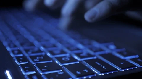 Man Writes Message to Social Network. Computer Hacker Typing Code Virus PC on Stock Footage 128676489