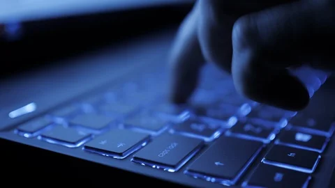 Man Writes Message to Social Network. Computer Hacker Typing Code Virus PC on Stock Footage 129597001