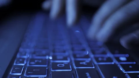 Man Writes Message to Social Network. Computer Hacker Typing Code Virus PC on Stock Footage 135528395