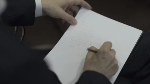 A man writes a note Stock Footage 159881419