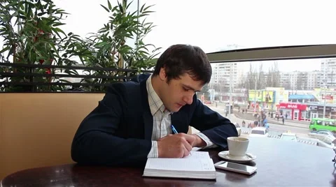 Man writes in notebook Stock-Footage 61263600