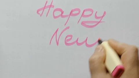 Man writes on paper Happy New year Stock Footage 80719925