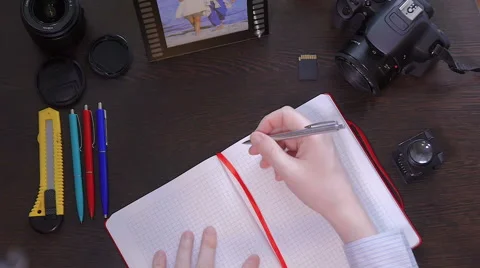 A man writes a pen in notebook Stock Footage 61343589