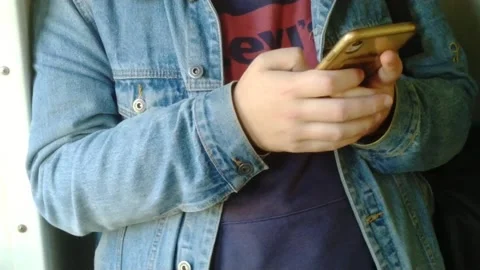 Man writes on smartphone Stock Footage 161322747