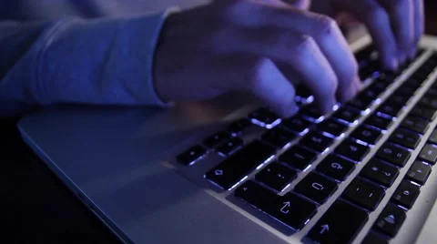 A man writes someting on the computer and press enter button / close up Stock Footage 67273608