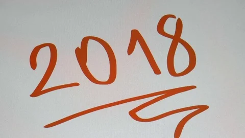 Man writes on a tablet of a happy new year Stock Footage 80719021