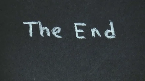 Man writes the word end Stock Footage 78911032